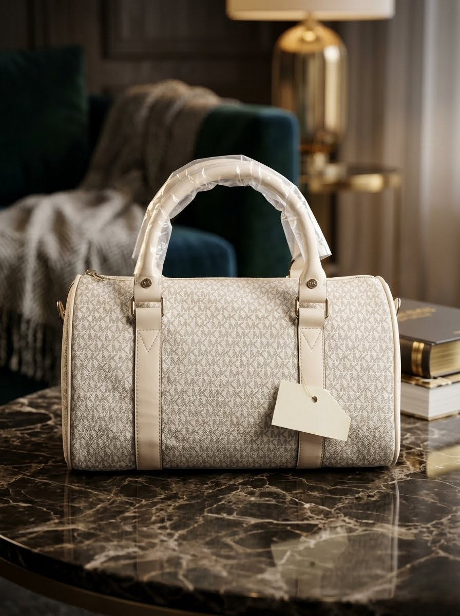 Elegant Michael Kors barrel duffel handbag