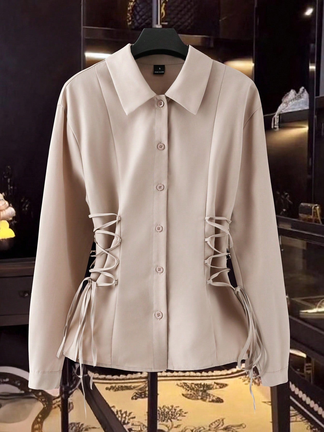 Beige long-sleeved button-up shirt
