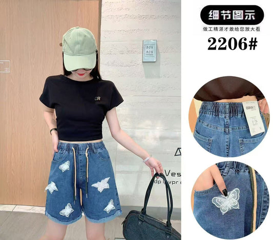 medium-wash denim shorts