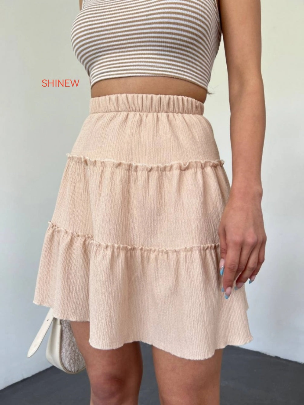 Charming beige mini skirt - short inside