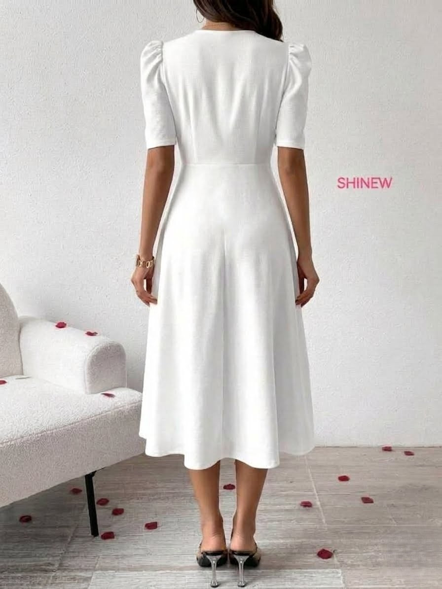 Elegant, midi-length white dress