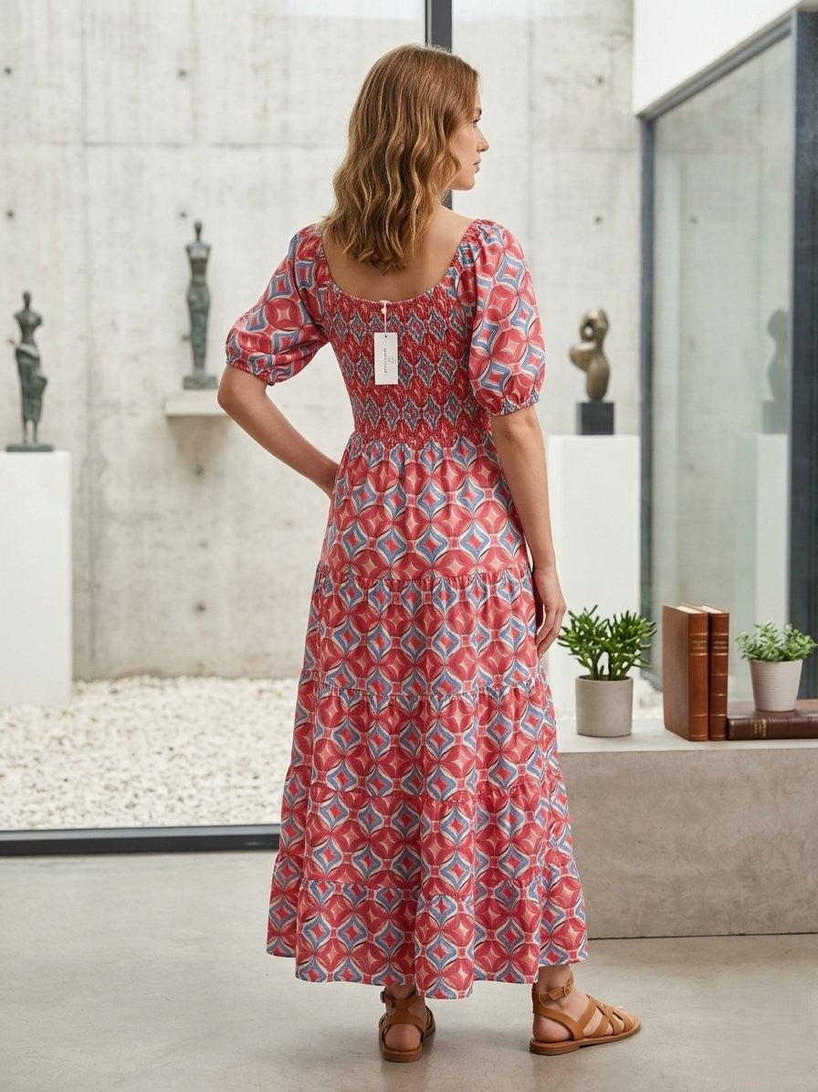 Vibrant bohemian-inspired maxi dress with eye-catching geometric tile pattern