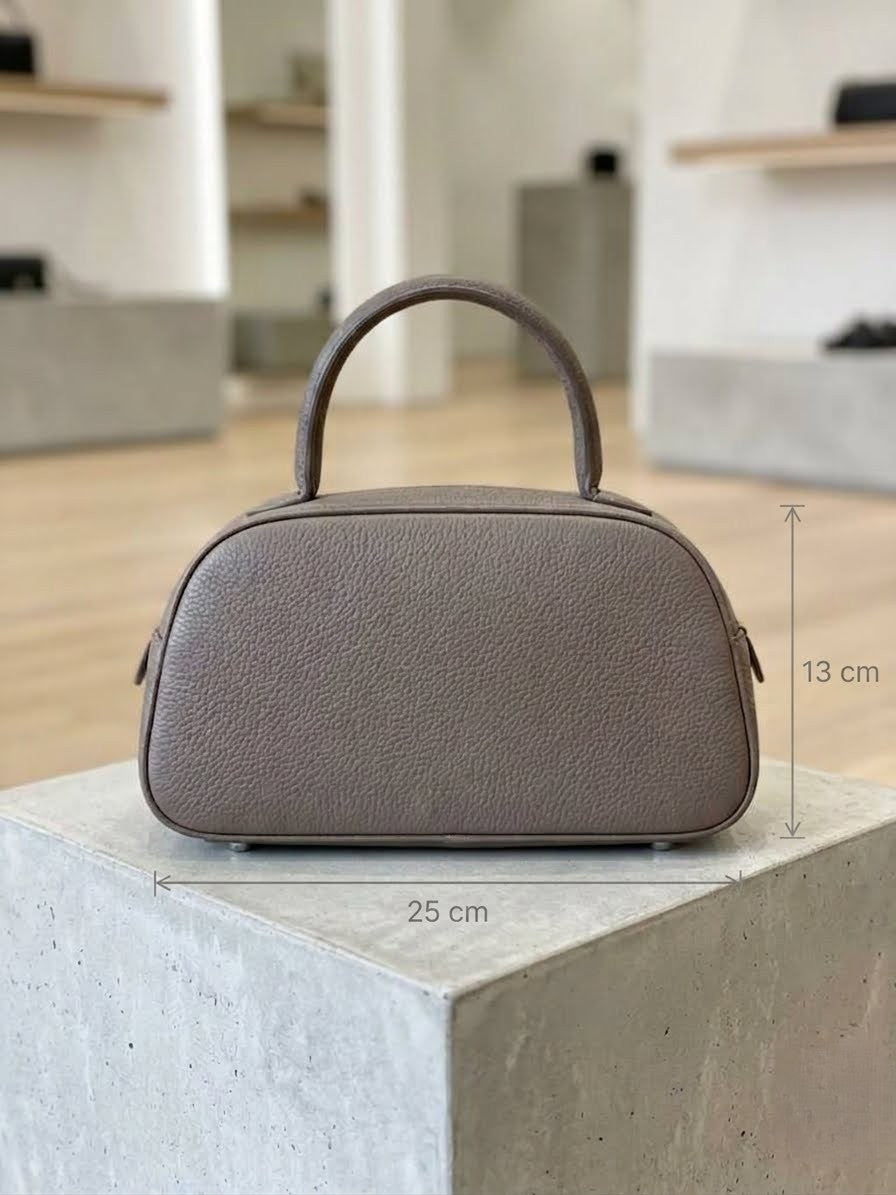 elegant women's domed bowling handbag