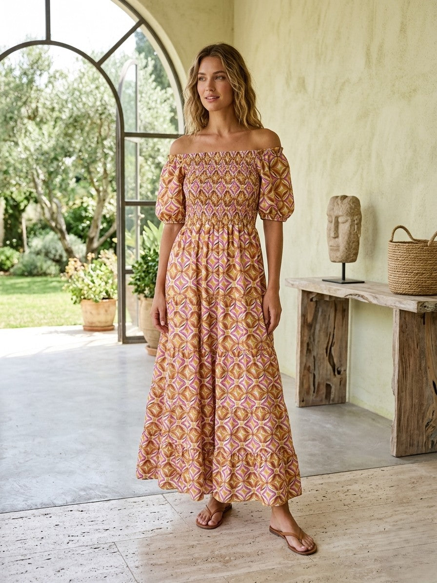 Vibrant bohemian-inspired maxi dress with eye-catching geometric tile pattern