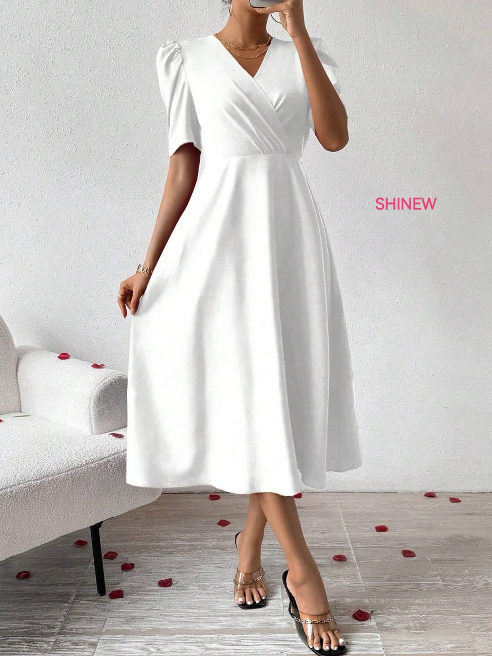 Elegant, midi-length white dress