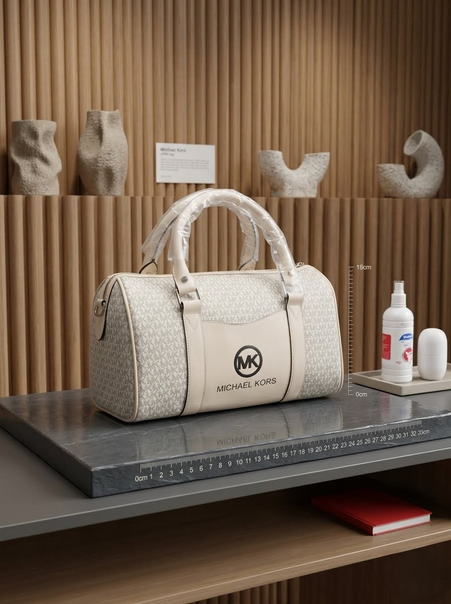 Elegant Michael Kors barrel duffel handbag