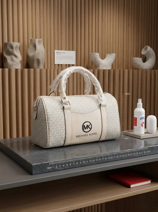 Elegant Michael Kors barrel duffel handbag