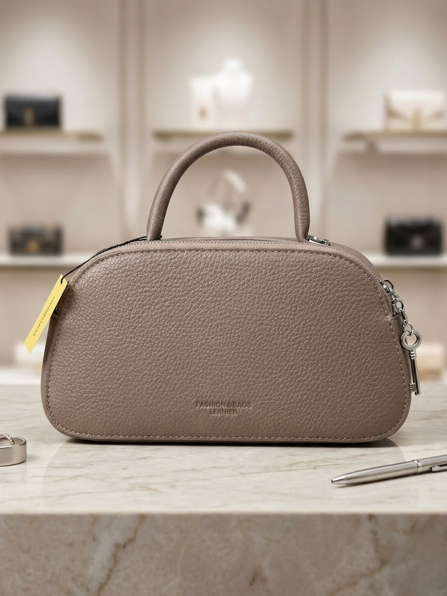elegant women's domed bowling handbag